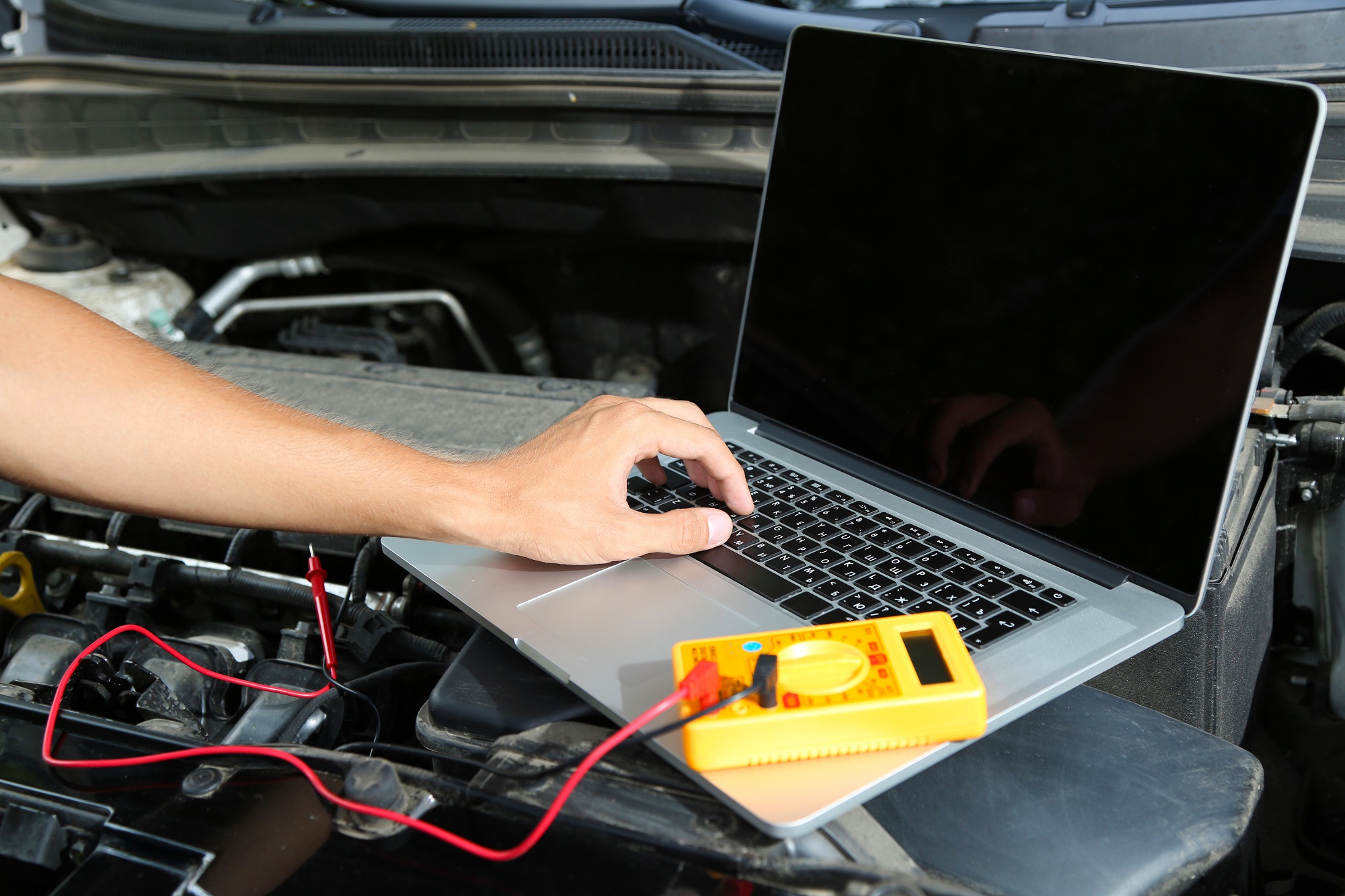 Professional Car Mechanic Working In Auto Repair Service